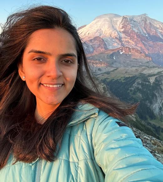Arzoo in front of a mountain