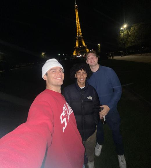 Rémi in front of the Eiffel Tower with friends Daniel Ramirez Minaya and Marshall Kagan.
