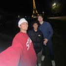 Rémi in front of the Eiffel Tower with friends Daniel Ramirez Minaya and Marshall Kagan.